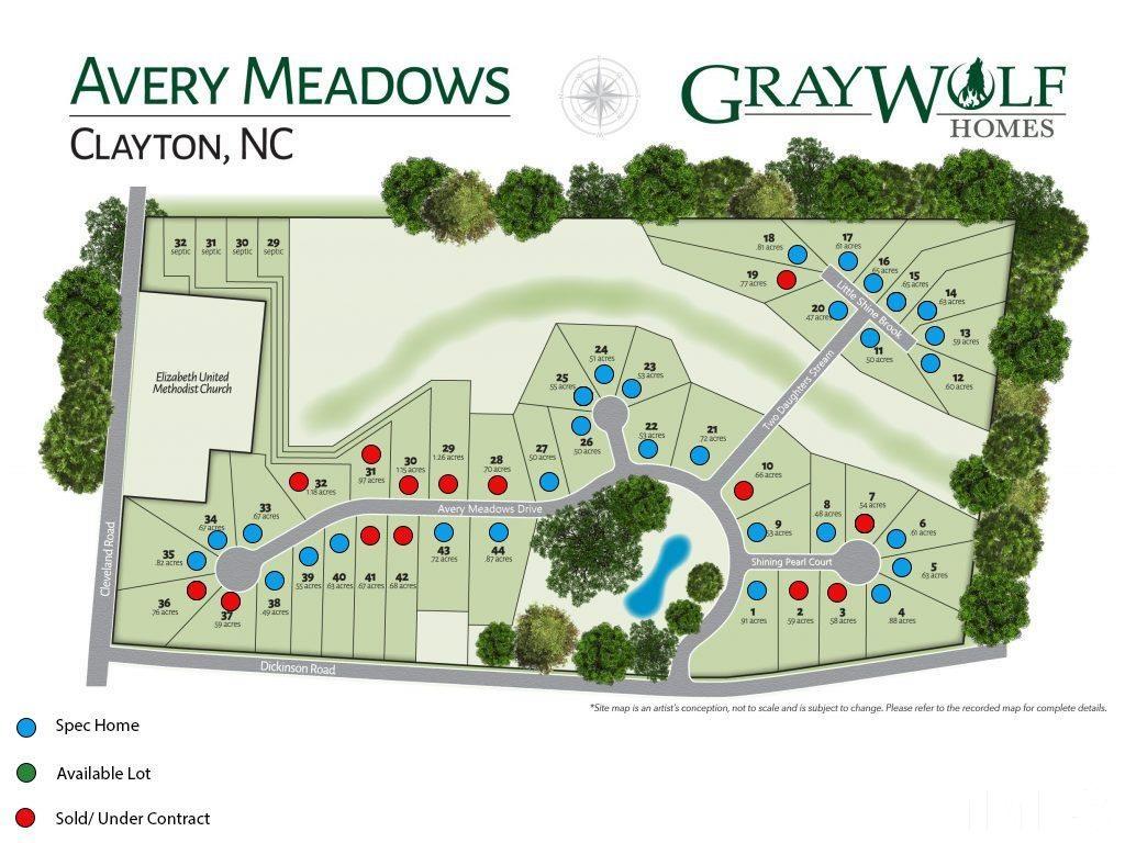 32 Daffodil Garden Court Smithfield, NC 27577 - Photo 18 of 19 a picture of a table and a white wooden table