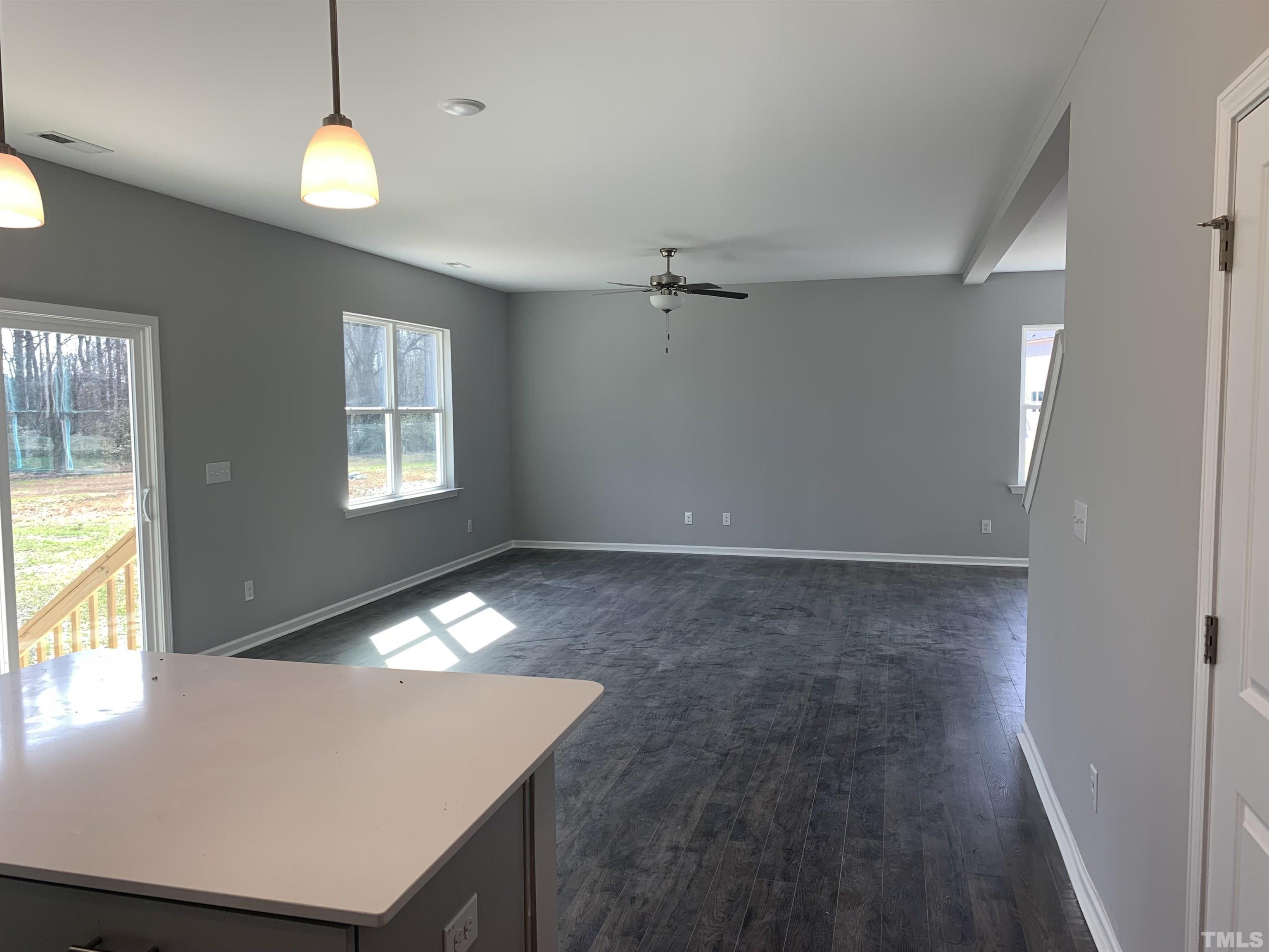 32 Daffodil Garden Court Smithfield, NC 27577 - Photo 7 of 19 a view of an empty room and window