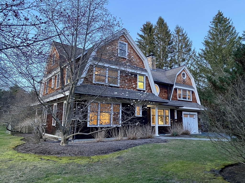 45 Sherman's Bridge Road Wayland, MA 01778 - Photo 1 of 20 a front view of a house with a yard