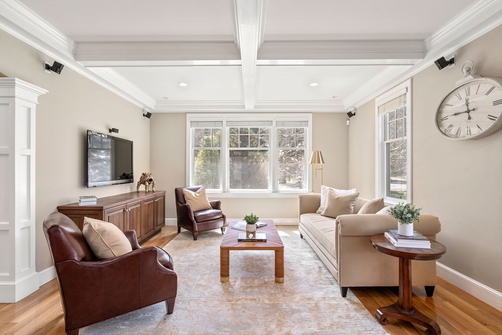 45 Sherman's Bridge Road Wayland, MA 01778 - Photo 13 of 20 a living room with furniture and a large window