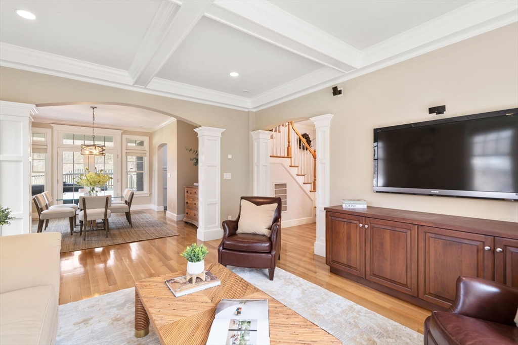 45 Sherman's Bridge Road Wayland, MA 01778 - Photo 14 of 20 a living room with furniture and a flat screen tv
