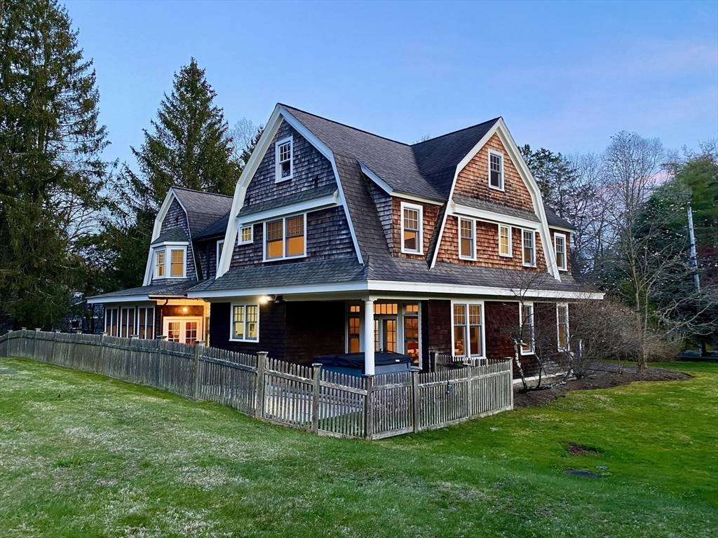45 Sherman's Bridge Road Wayland, MA 01778 - Photo 2 of 20 a front view of house with yard and green space