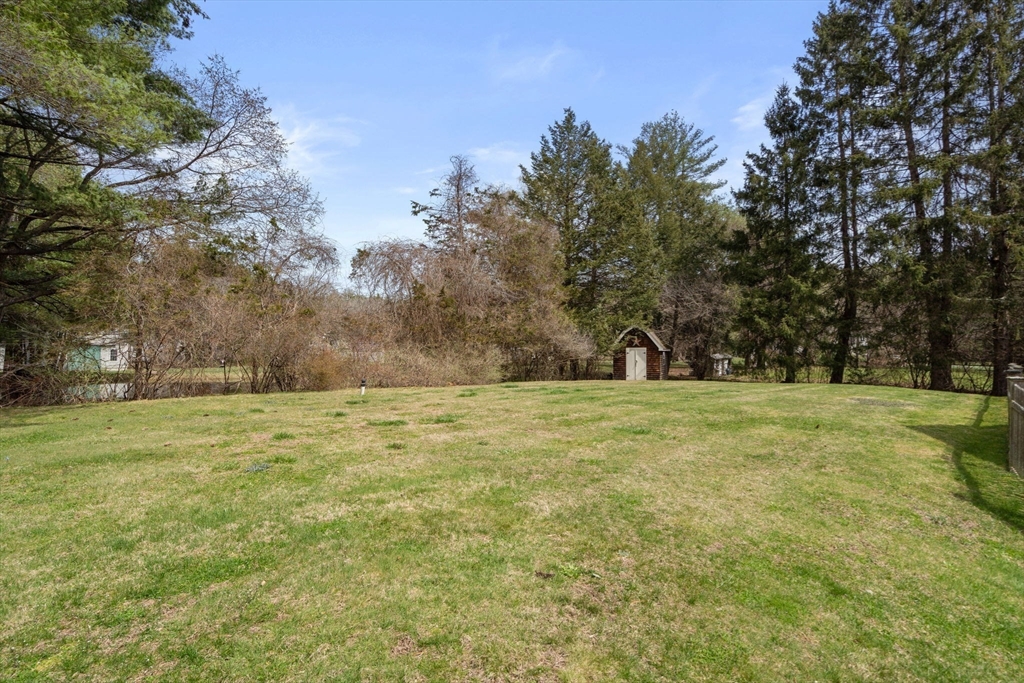 45 Sherman's Bridge Road Wayland, MA 01778 - Photo 4 of 20 a view of outdoor space with trees