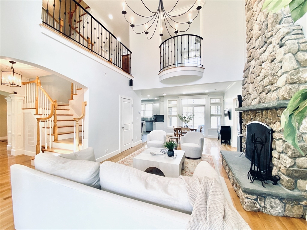 45 Sherman's Bridge Road Wayland, MA 01778 - Photo 5 of 20 a living room with fireplace furniture and a fireplace