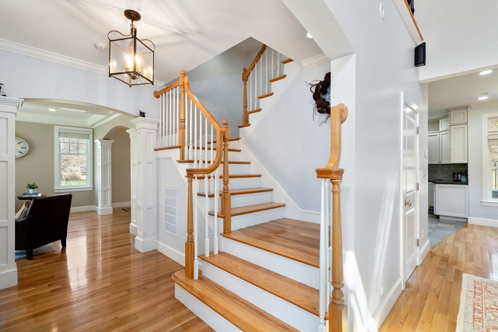 45 Sherman's Bridge Road Wayland, MA 01778 - Photo 6 of 20 a view of entryway and hall with wooden floor