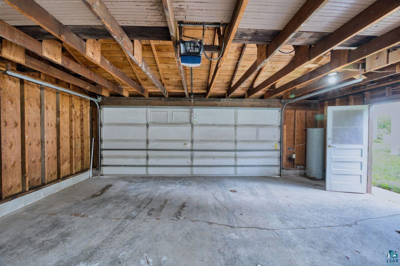 4191 Kerr Location Hibbing, MN 55746 - Photo 23 of 37 Garage with a garage door opener