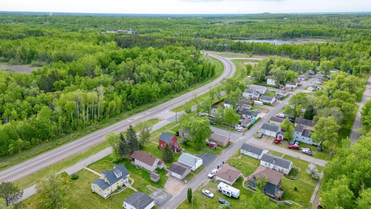 4191 Kerr Location Hibbing, MN 55746 - Photo 37 of 37 View of property location featuring a forest, nearby suburban area, and a large body of water