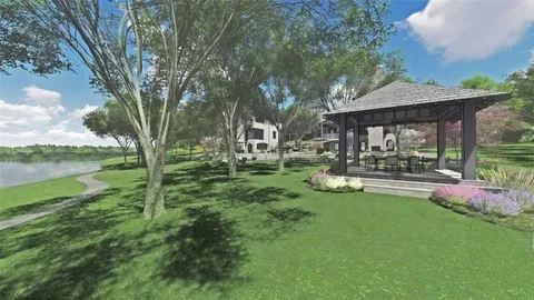 a view of a patio with a table chairs under an umbrella