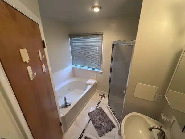 a bathroom with a sink and toilet