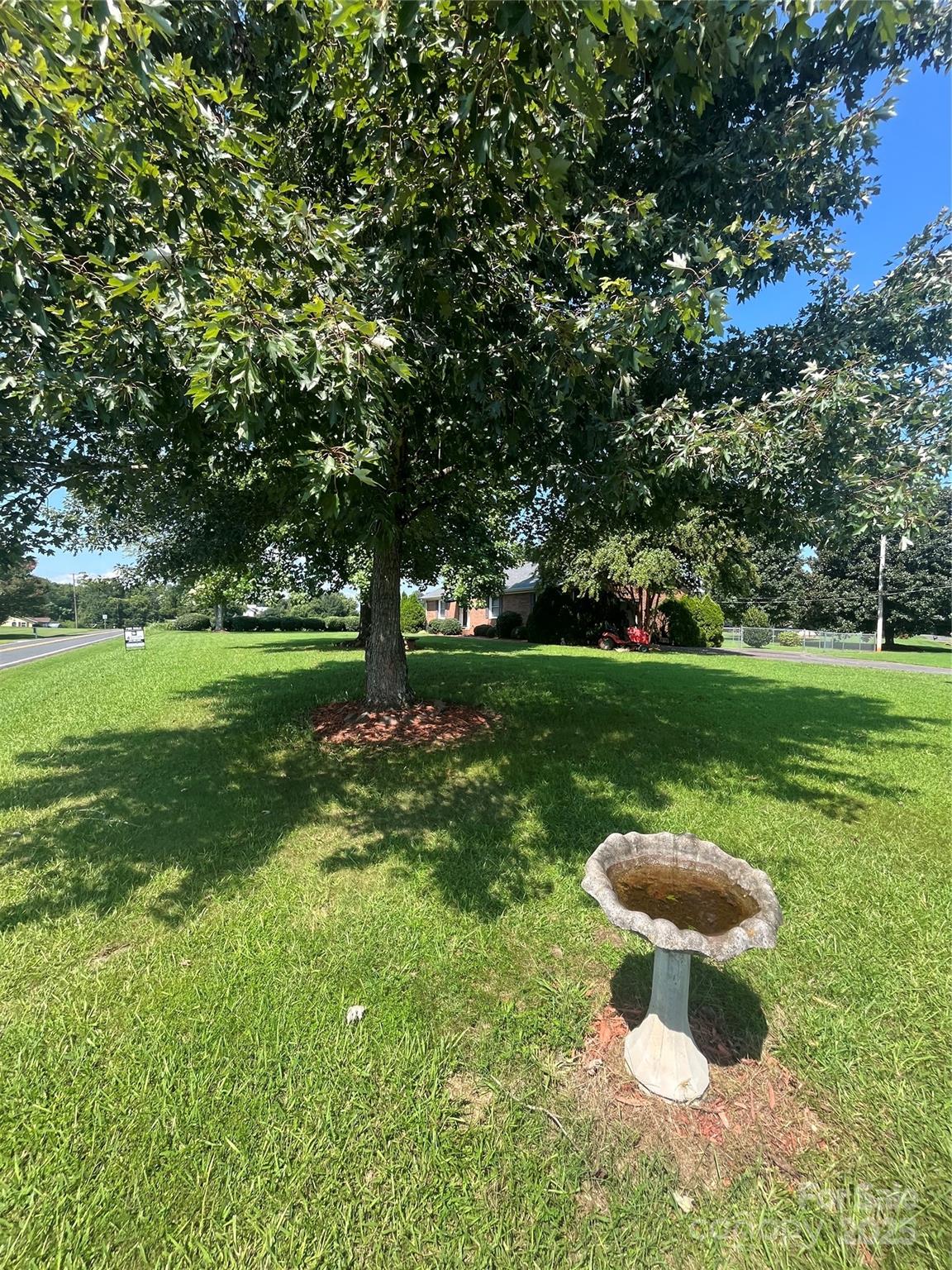35209 Beth Road Albemarle, NC 28001 - Photo 14 of 38 a view of a garden with an outdoor space