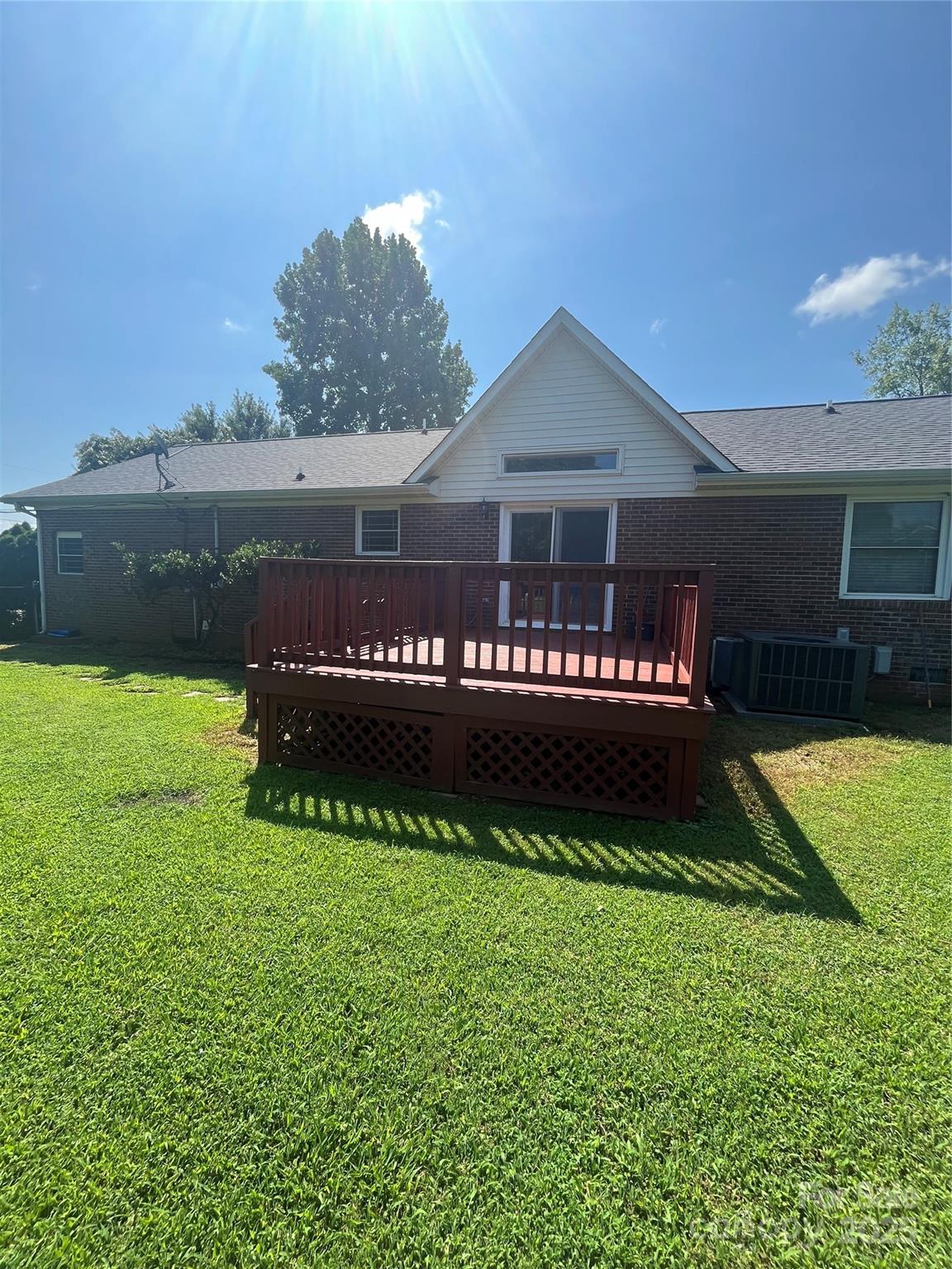 35209 Beth Road Albemarle, NC 28001 - Photo 17 of 38 a view of a house with a yard