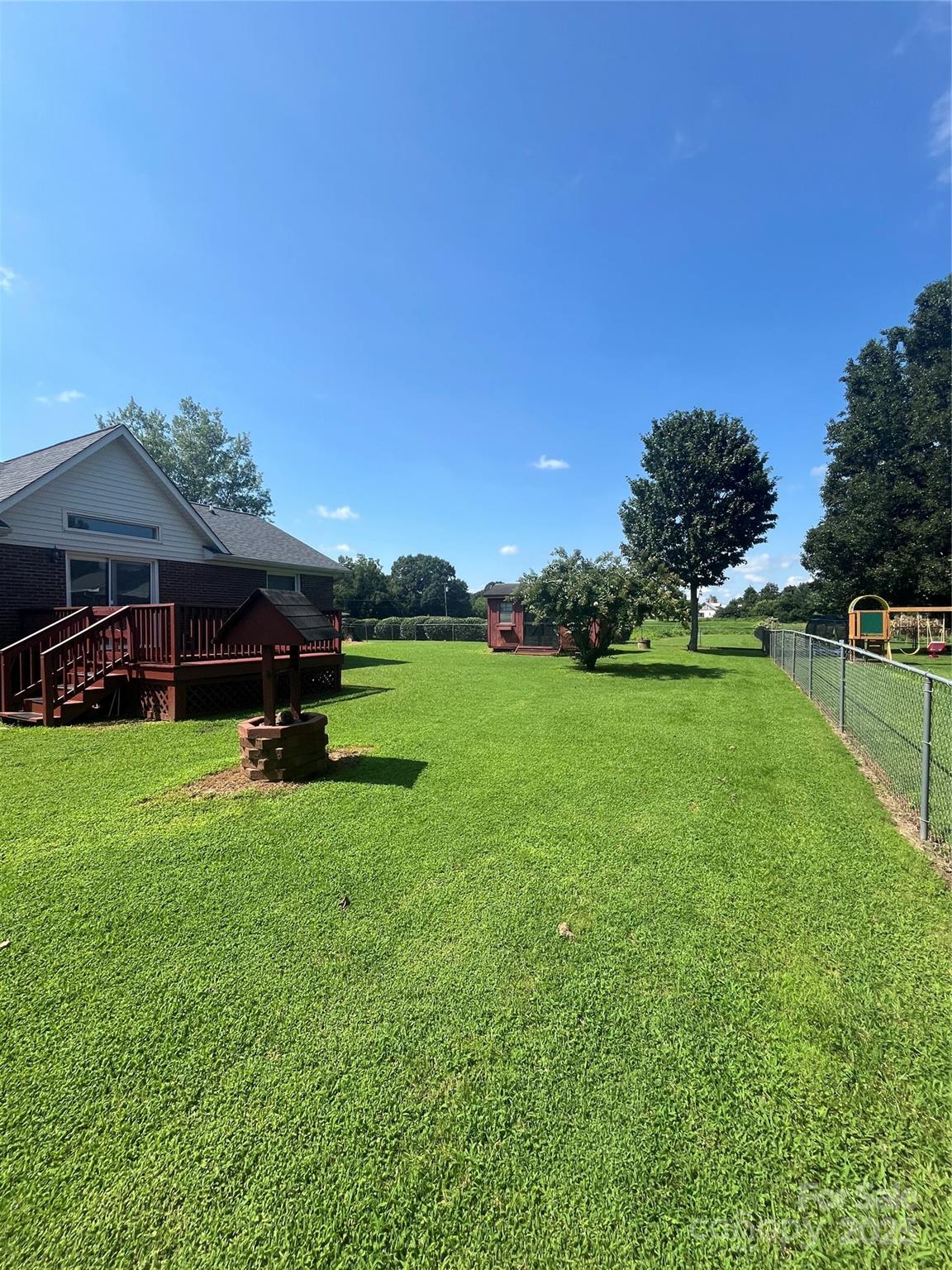 35209 Beth Road Albemarle, NC 28001 - Photo 18 of 38 a view of a house with a big yard
