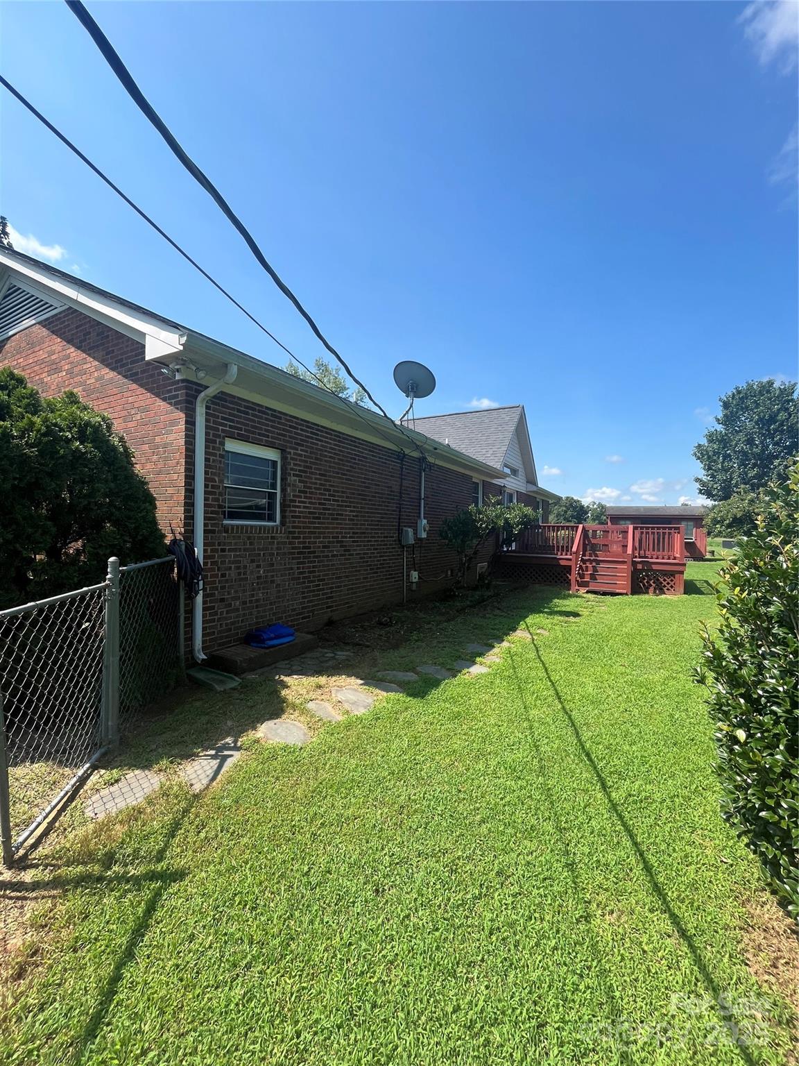 35209 Beth Road Albemarle, NC 28001 - Photo 19 of 38 a view of a house with a backyard