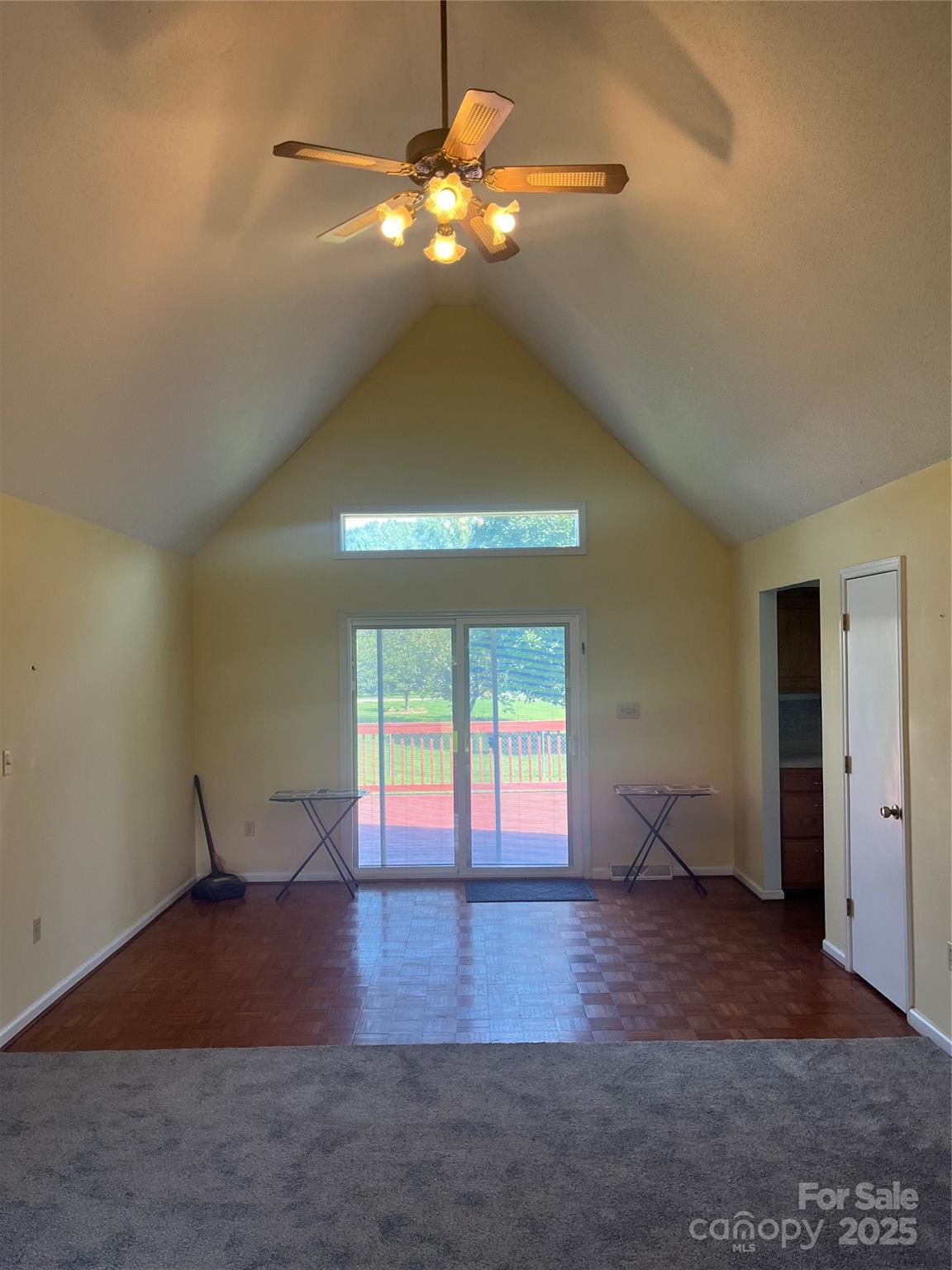35209 Beth Road Albemarle, NC 28001 - Photo 23 of 38 a view of an empty room with window and wooden floor