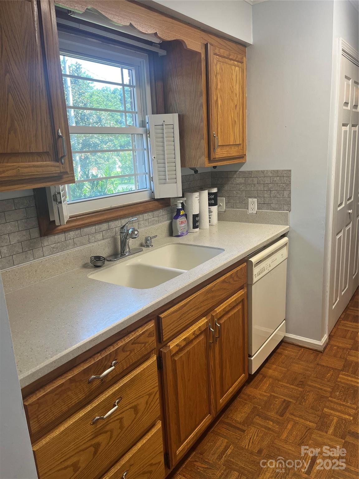 35209 Beth Road Albemarle, NC 28001 - Photo 24 of 38 a kitchen with a sink cabinets and window