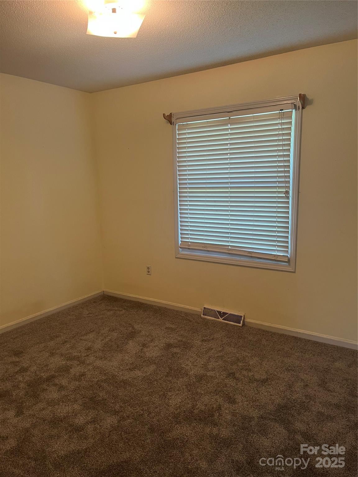 35209 Beth Road Albemarle, NC 28001 - Photo 31 of 38 an empty room with a window