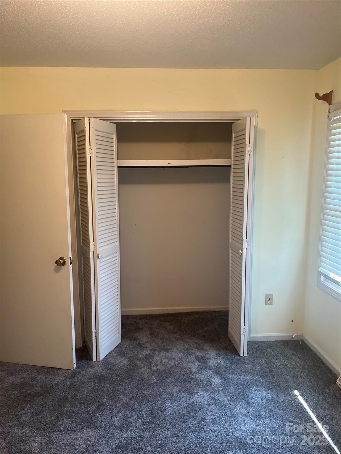 35209 Beth Road Albemarle, NC 28001 - Photo 32 of 38 an empty room with closet