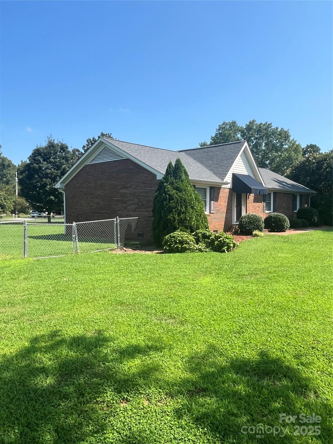 35209 Beth Road Albemarle, NC 28001 - Photo 4 of 38 a front view of house with yard and green space