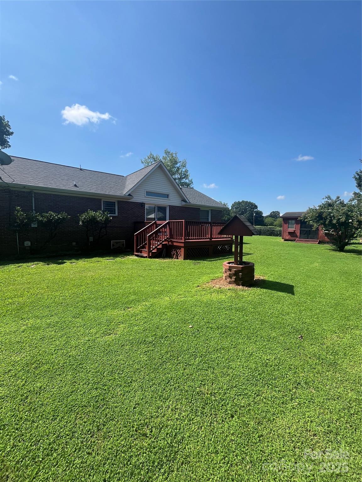 35209 Beth Road Albemarle, NC 28001 - Photo 5 of 38 a view of a house with a yard porch and sitting area