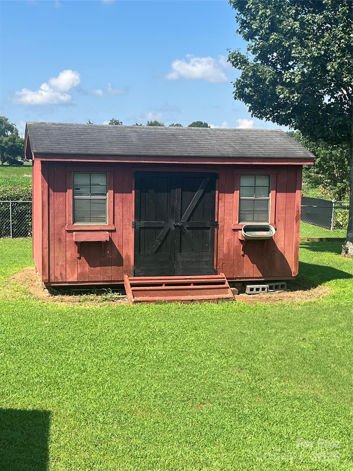 35209 Beth Road Albemarle, NC 28001 - Photo 10 of 38 a front view of a house with garden