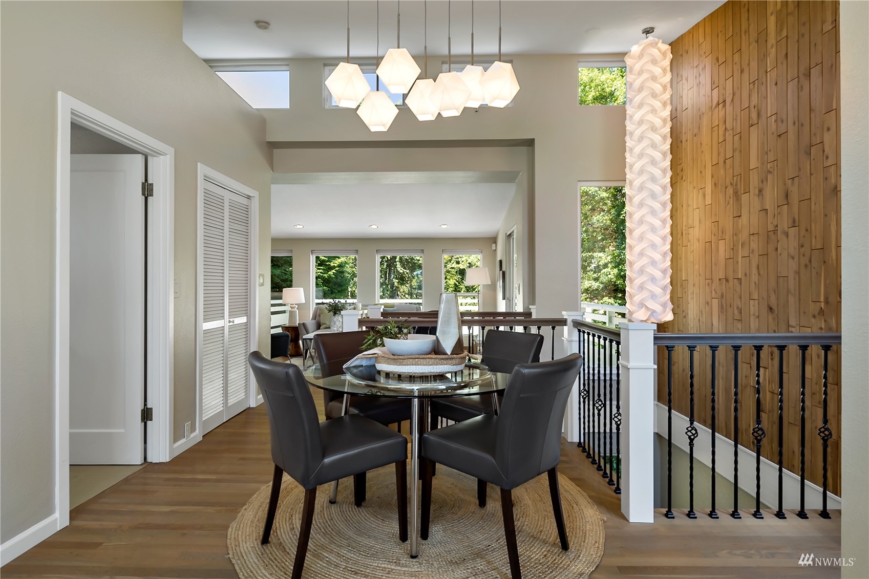 1724 26th Avenue Seattle, WA 98122 - Photo 12 of 37 a dining room with furniture a chandelier and wooden floor