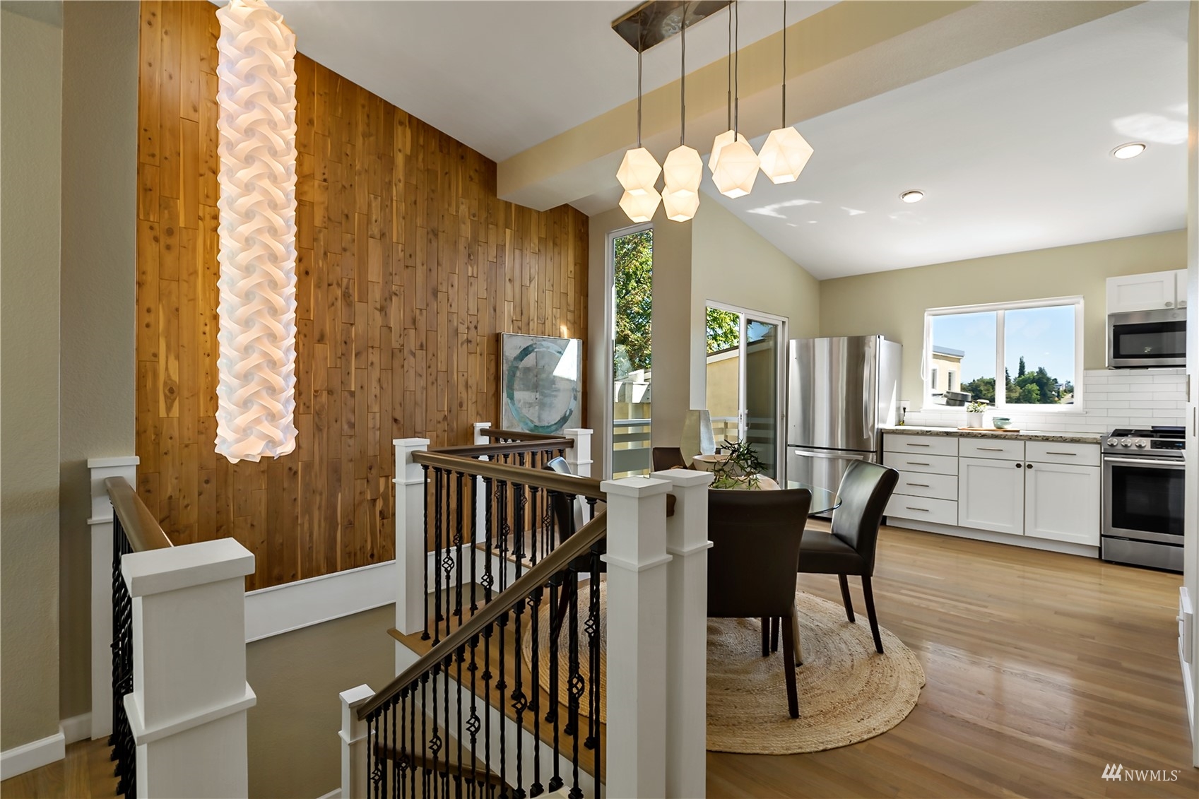 1724 26th Avenue Seattle, WA 98122 - Photo 14 of 37 a view of a dining room with furniture window and wooden floor