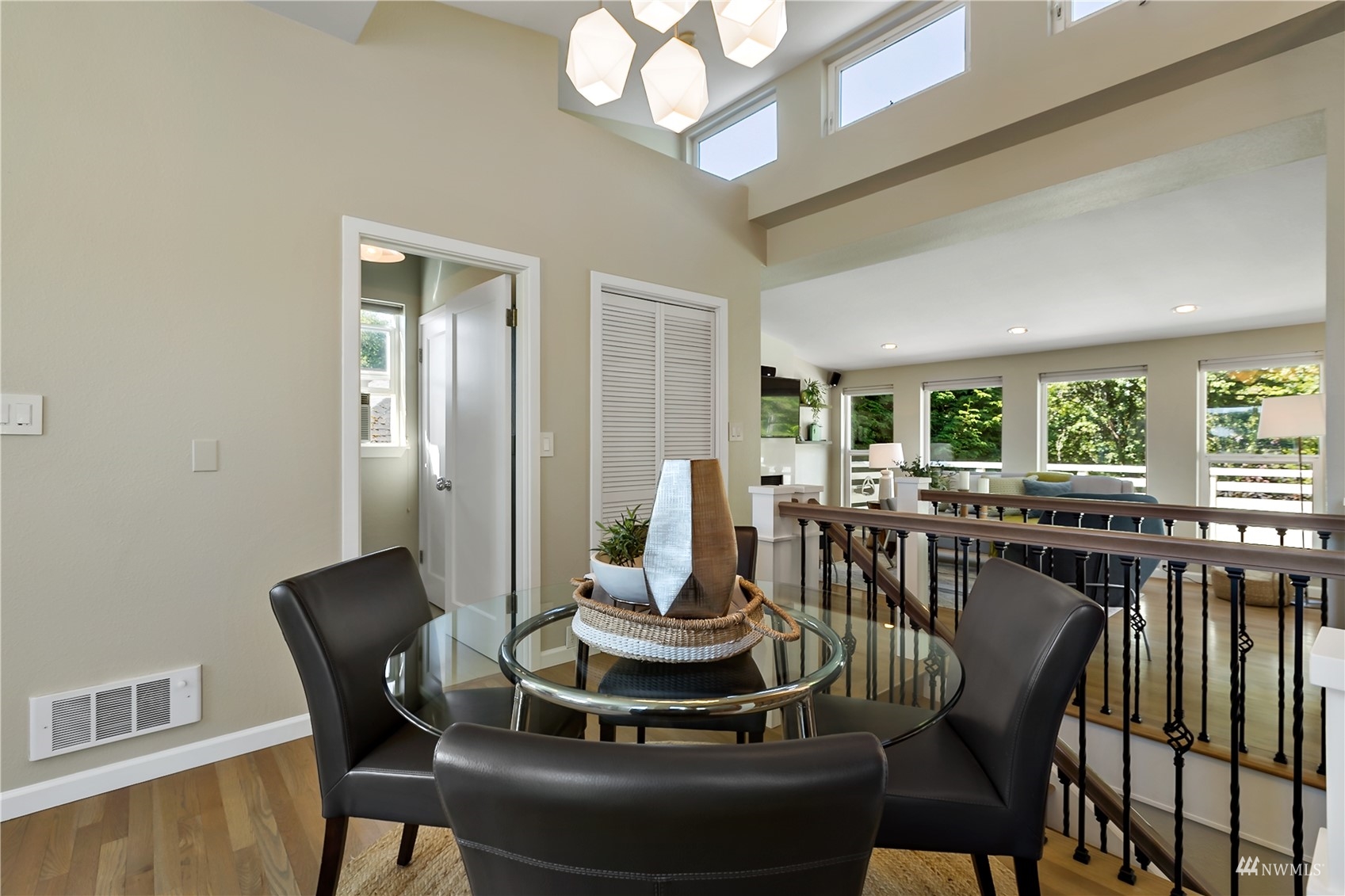 1724 26th Avenue Seattle, WA 98122 - Photo 19 of 37 a dining room with furniture a rug and wooden floor
