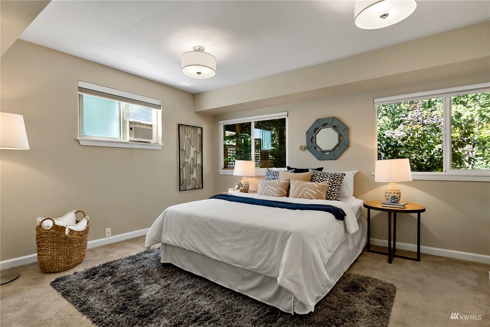 1724 26th Avenue Seattle, WA 98122 - Photo 22 of 37 a bedroom with a bed and window