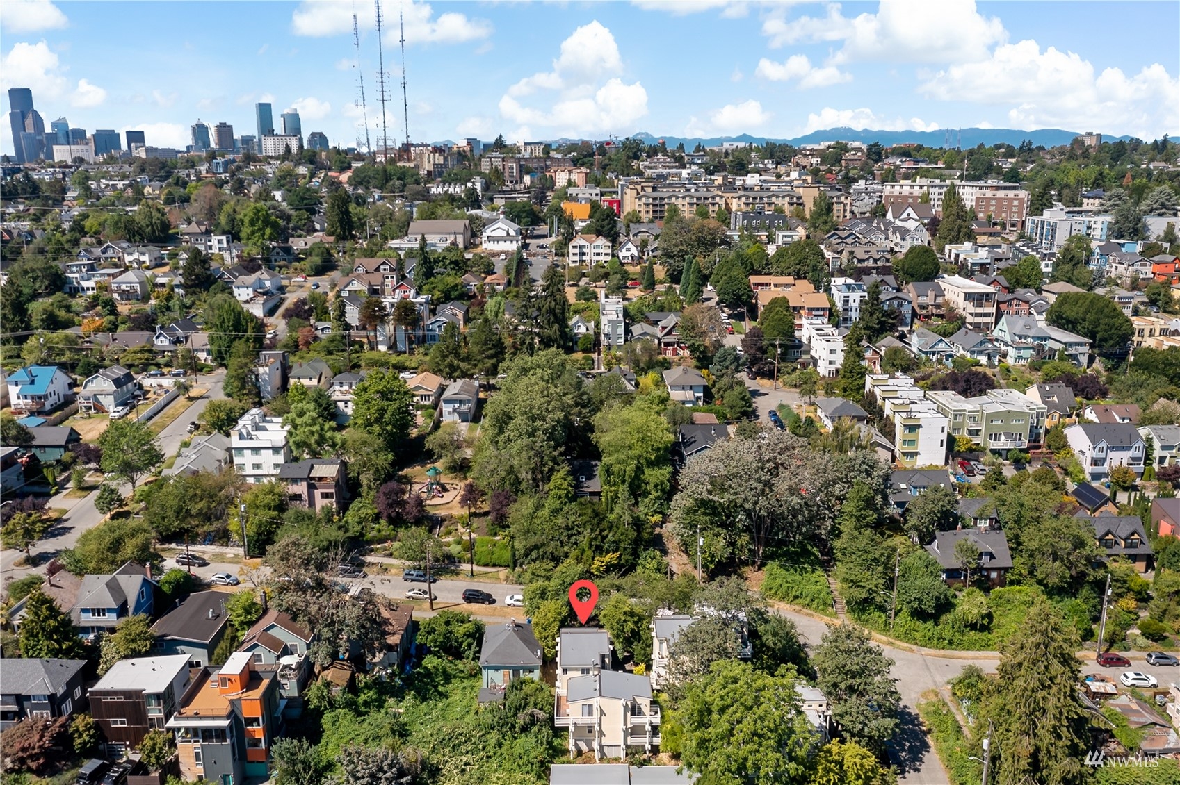 1724 26th Avenue Seattle, WA 98122 - Photo 32 of 37 an aerial view of residential houses with city view