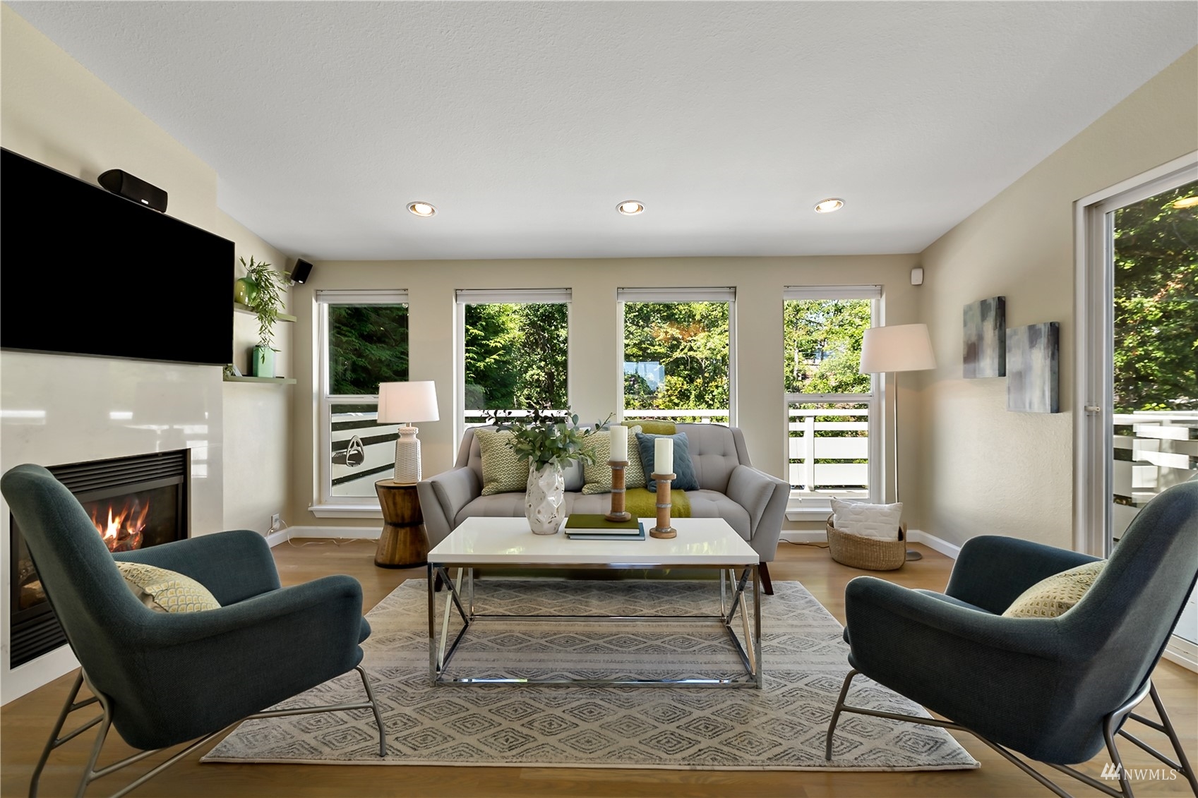 1724 26th Avenue Seattle, WA 98122 - Photo 4 of 37 a living room with fireplace furniture and a flat screen tv