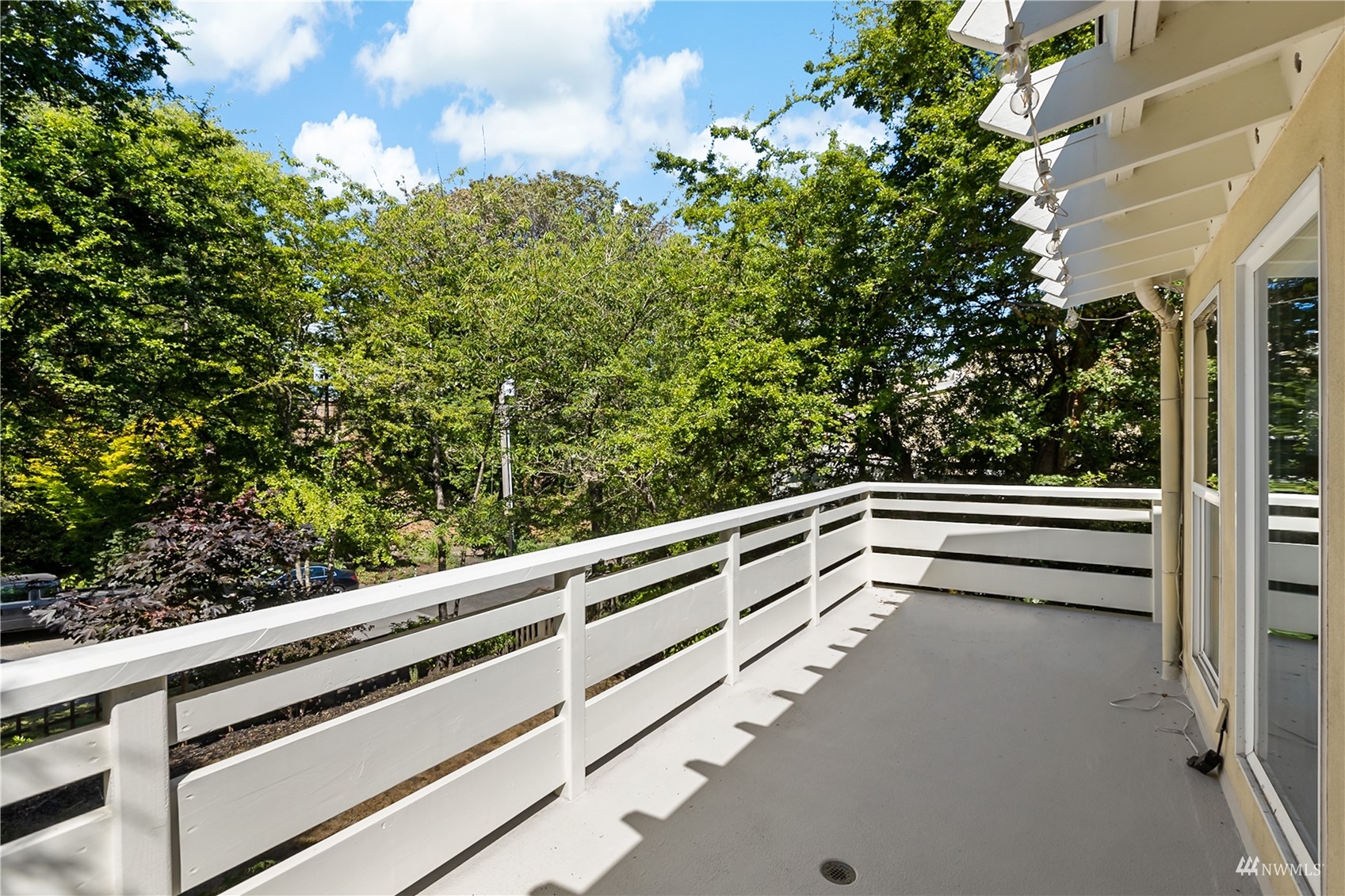 1724 26th Avenue Seattle, WA 98122 - Photo 8 of 37 a view of deck with large trees
