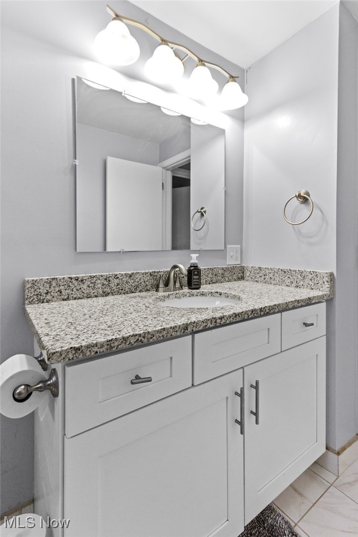 1824 Amherst Road Northeast Massillon, OH 44646 - Photo 18 of 34 Bathroom with vanity