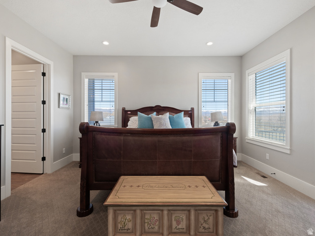 641 West 500 South Midway, UT 84049 - Photo 22 of 52 Carpeted room featuring a ceiling fan with integrated lighting, recessed lighting, and two windows with blinds