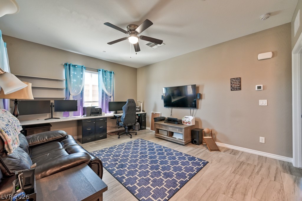 1054 Langston Ranch Avenue Henderson, NV 89002 - Photo 27 of 82 CASITA Main Living room with lighted ceiling fan