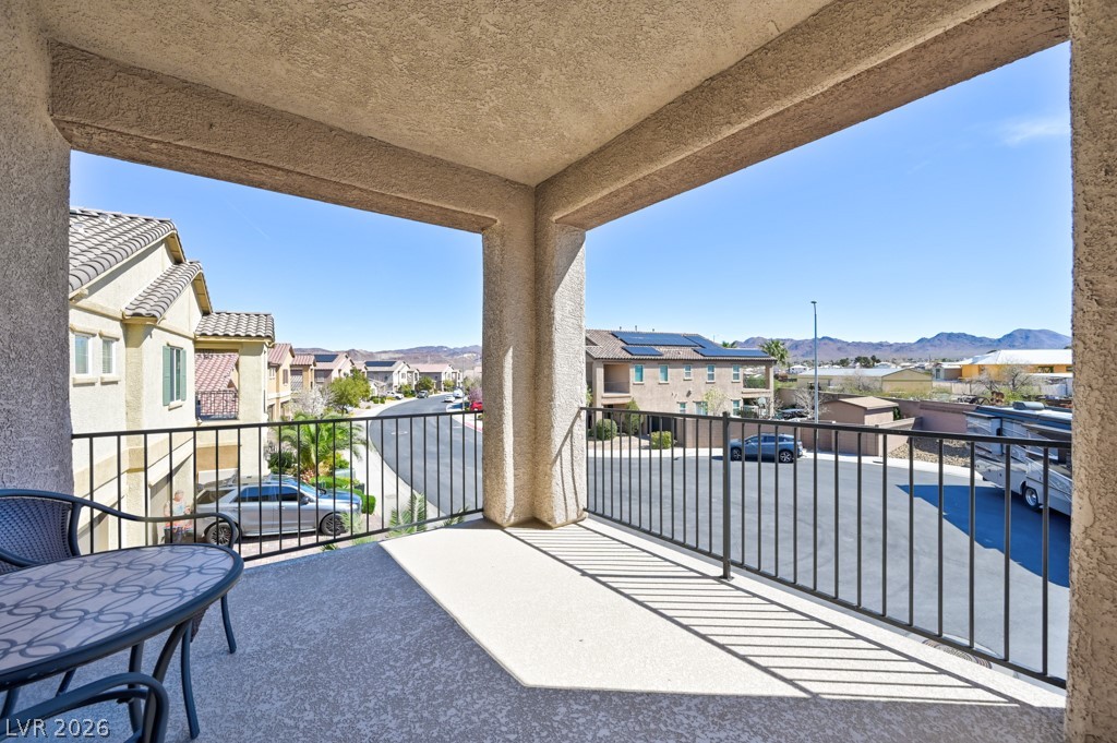 1054 Langston Ranch Avenue Henderson, NV 89002 - Photo 37 of 82 Balcony featuring a Stunning Mountain and residential view of the South and the East.