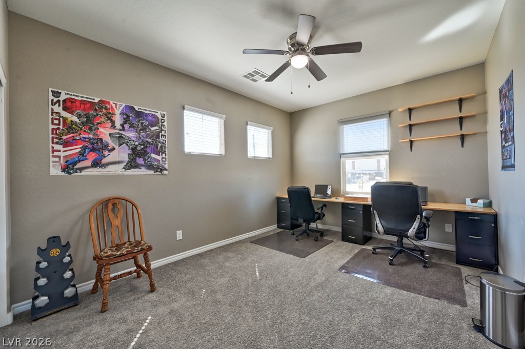 1054 Langston Ranch Avenue Henderson, NV 89002 - Photo 39 of 82 Bedroom Two 17.1 x11 Carpeted bedroom can be used as a home office with lighted ceiling fan. The TWO HARD WIRED INTERNET PORTS are a USEFUL and VALUABLE ADDITION.