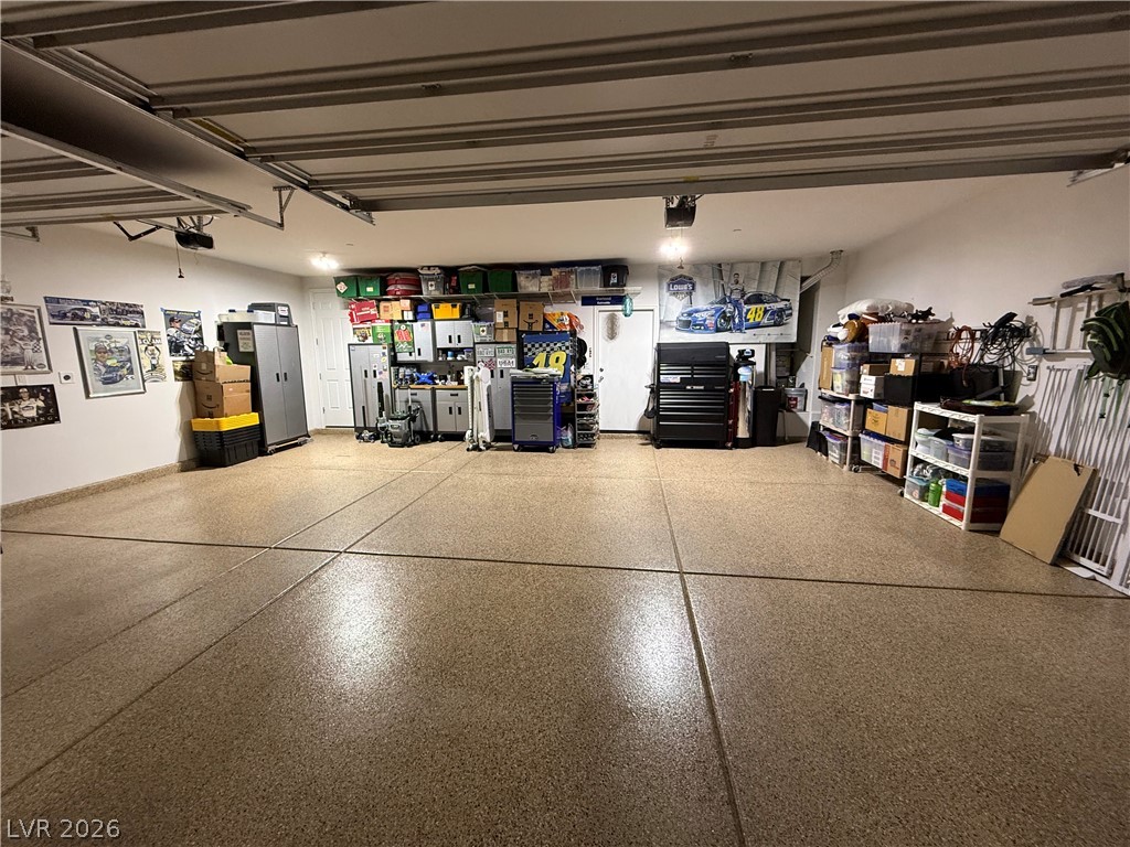 1054 Langston Ranch Avenue Henderson, NV 89002 - Photo 62 of 82 View of 3 car garage 682 SF. Incredible epoxy floors.