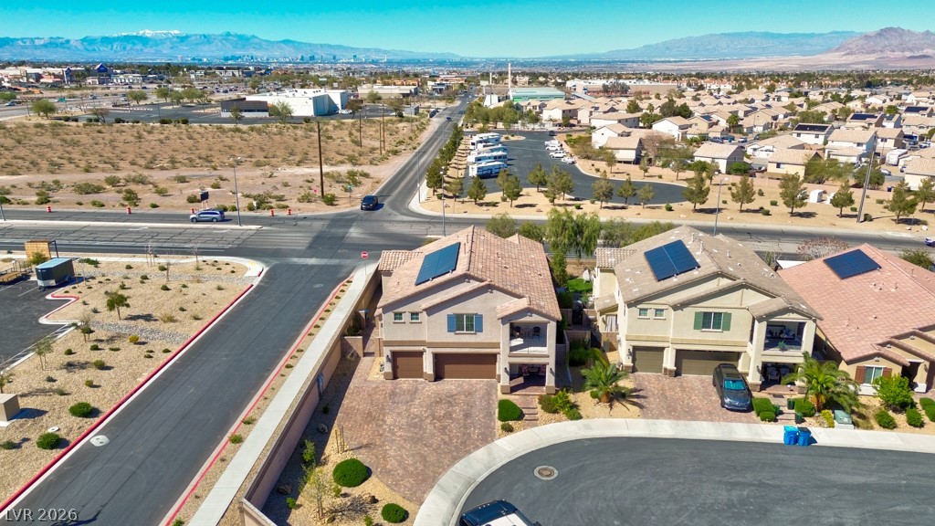 1054 Langston Ranch Avenue Henderson, NV 89002 - Photo 67 of 82 Aerial perspective of suburban area featuring mountains