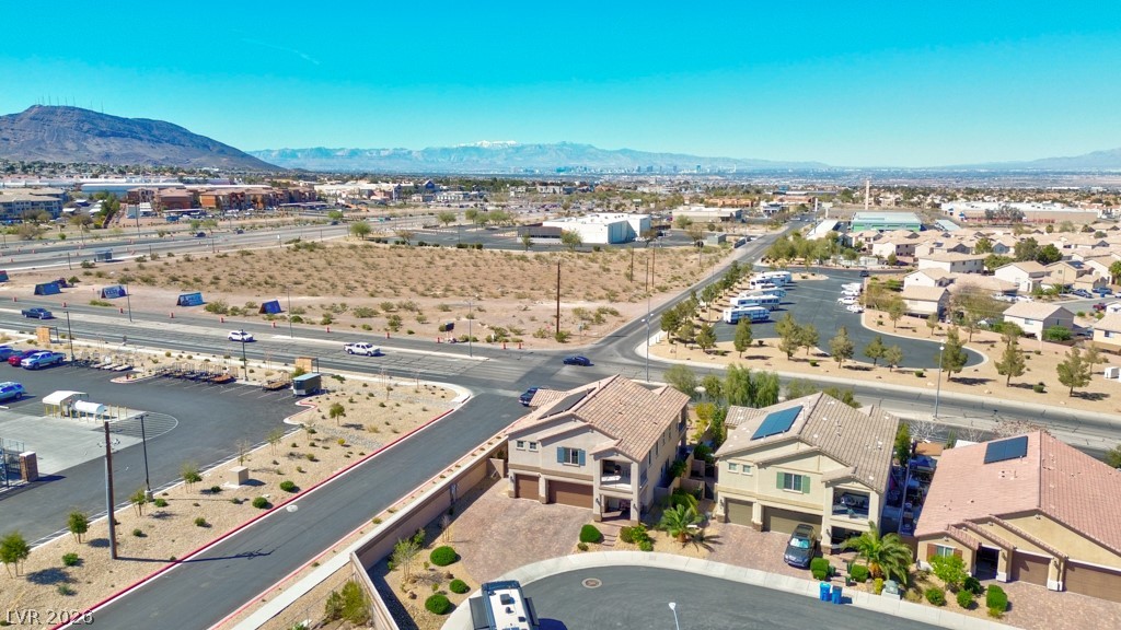 1054 Langston Ranch Avenue Henderson, NV 89002 - Photo 70 of 82 Aerial perspective of suburban area featuring a mountain backdrop