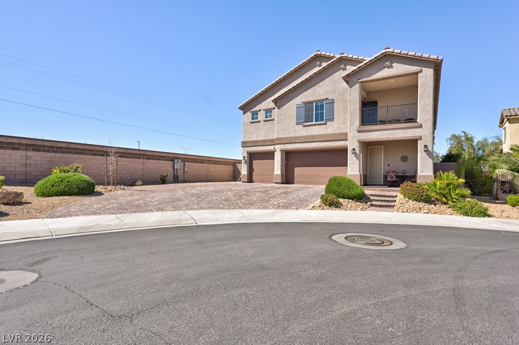 1054 Langston Ranch Avenue Henderson, NV 89002 - Photo 9 of 82 View of front of home at the end of a cul de sac.