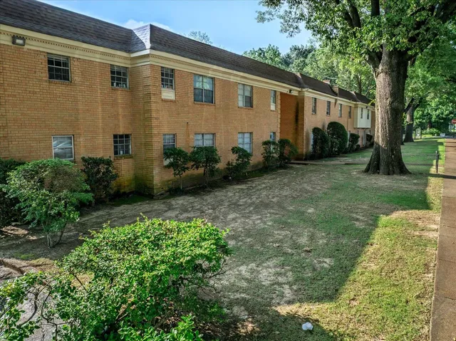 a view of a back yard of the house