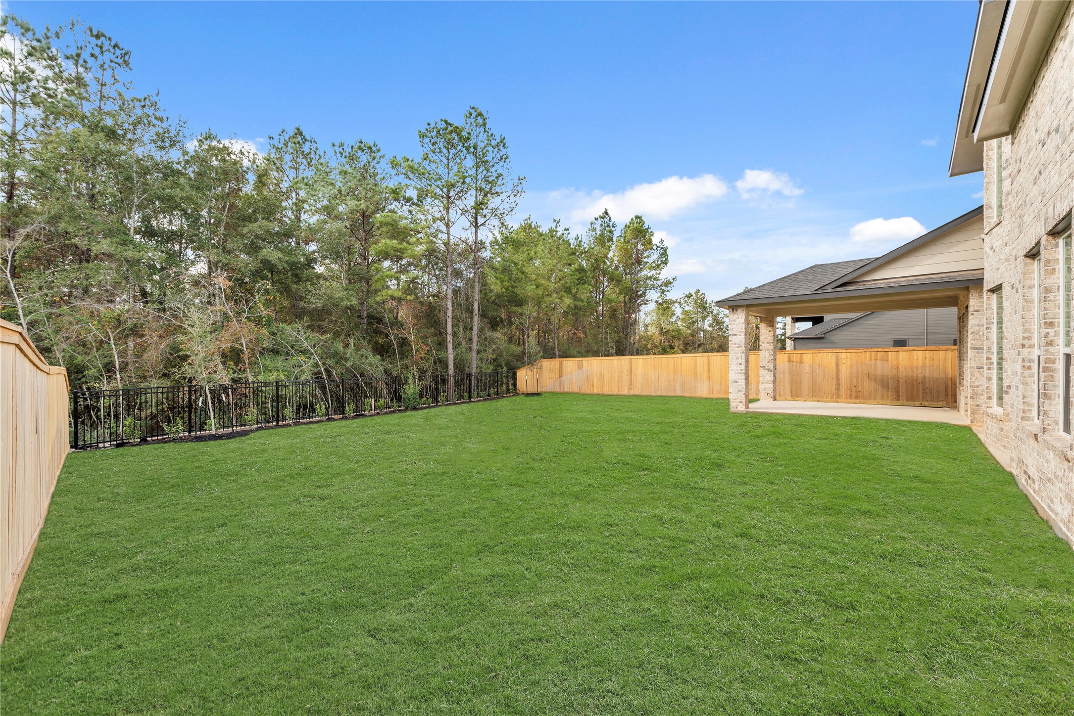 27016 West W Ranch Montgomery, TX 77316 - Photo 22 of 28 Grass is digitally enhanced.