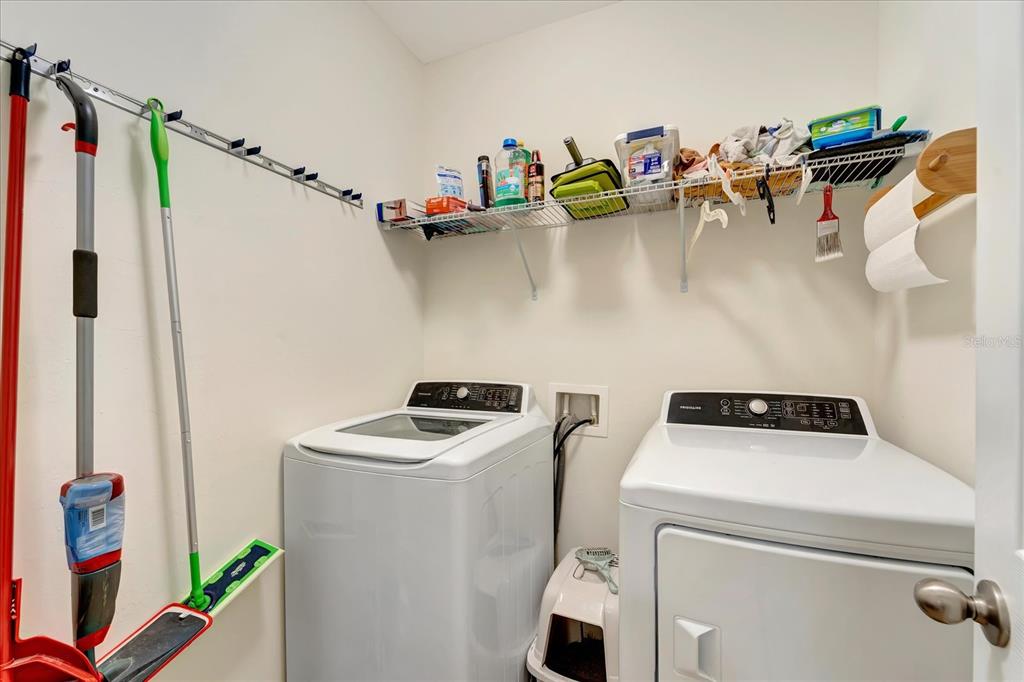 8997 Excelsior Loop Venice, FL 34293 - Photo 26 of 48 a room with storage and utility