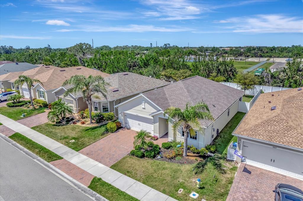 8997 Excelsior Loop Venice, FL 34293 - Photo 4 of 48 an aerial view of a house with a garden