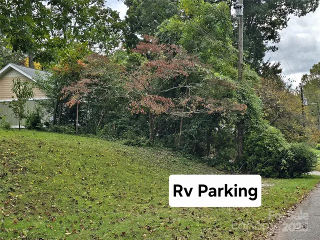 a sign that is on a brick wall