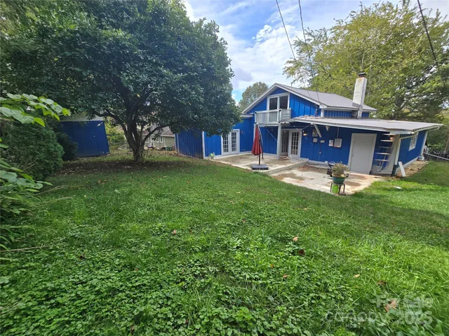 a house with garden in front of it