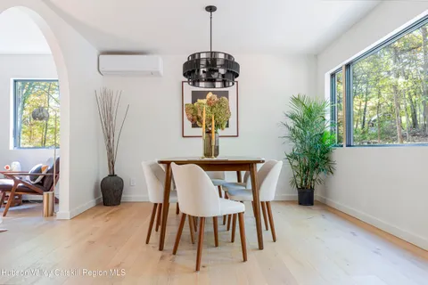 a bedroom with a bed and a chair