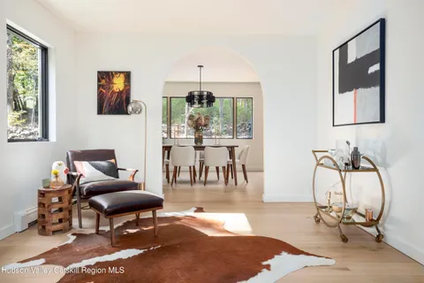 a front view of a house with a sitting area