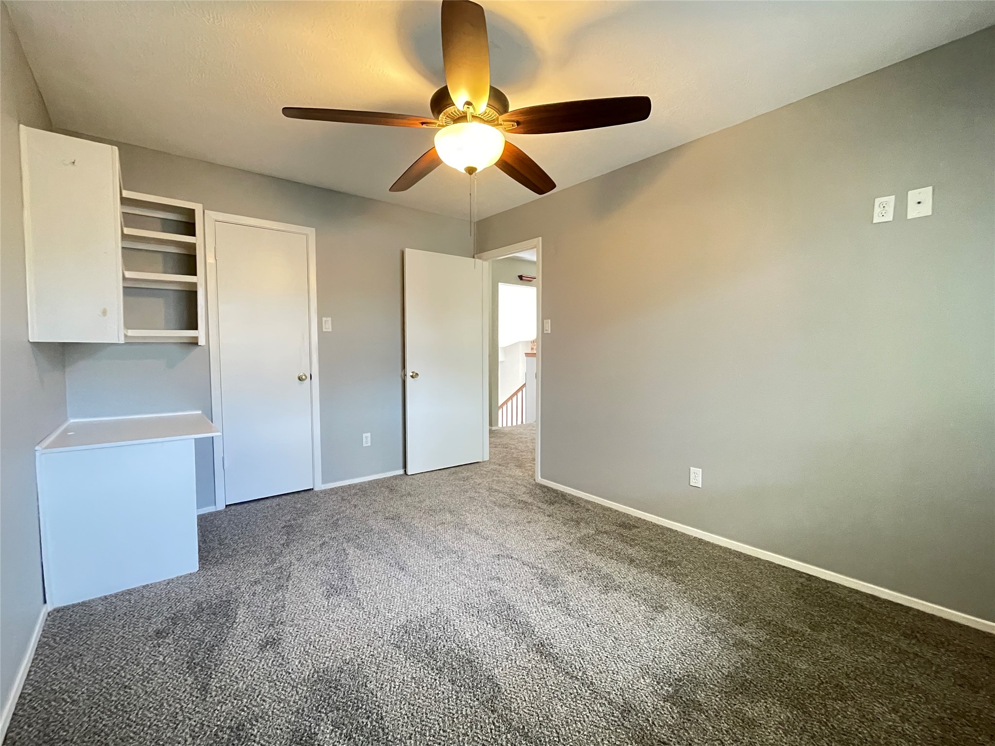5006 Temple Bell Drive Spring, TX 77388 - Photo 18 of 27 Secondary bedroom 1 featuring built-in desk