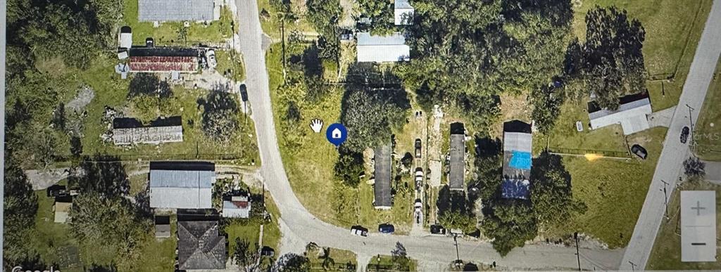 2420 Gerties Road Bartow, FL 33830 - Photo 2 of 3 an aerial view of a residential apartment building with a yard